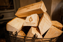 Load image into Gallery viewer, Wire log basket filled with firewood logs.
